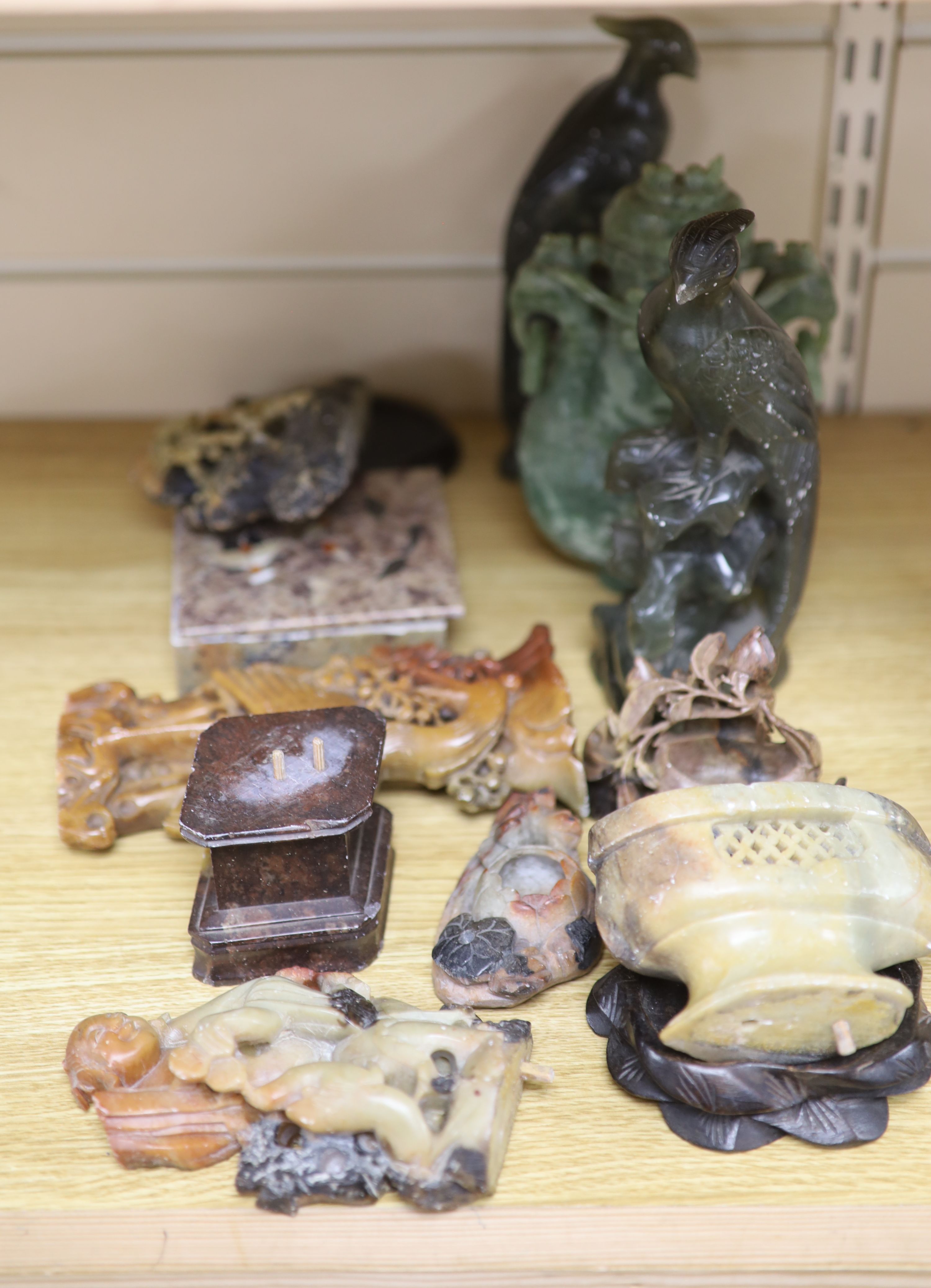 A collection of hardstone and soapstone carvings